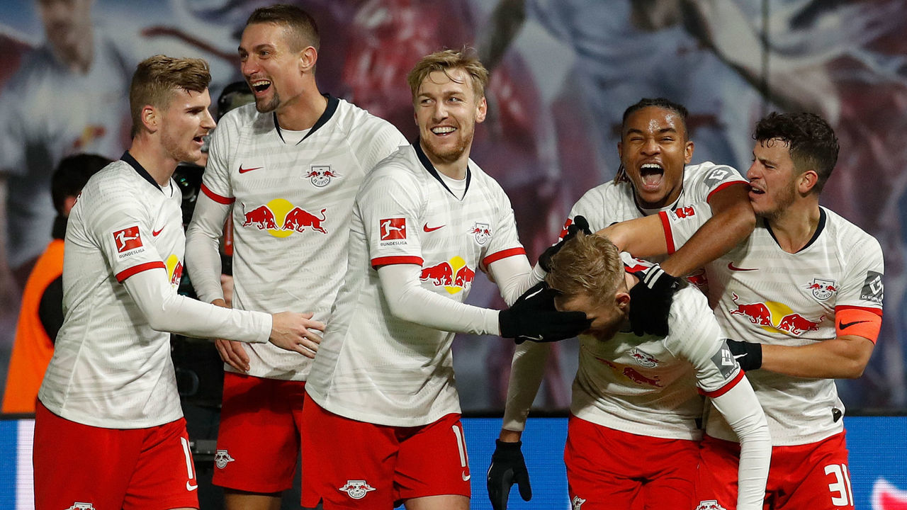 Leipzig's Austrian midfielder Konrad Laimer (3rd R) celebrates scoring the 3-0 goal with his team-mates during the German first division Bundesliga football match RB Leipzig v FC Cologne in Leipzig, eastern Germany, on November 23, 2019.