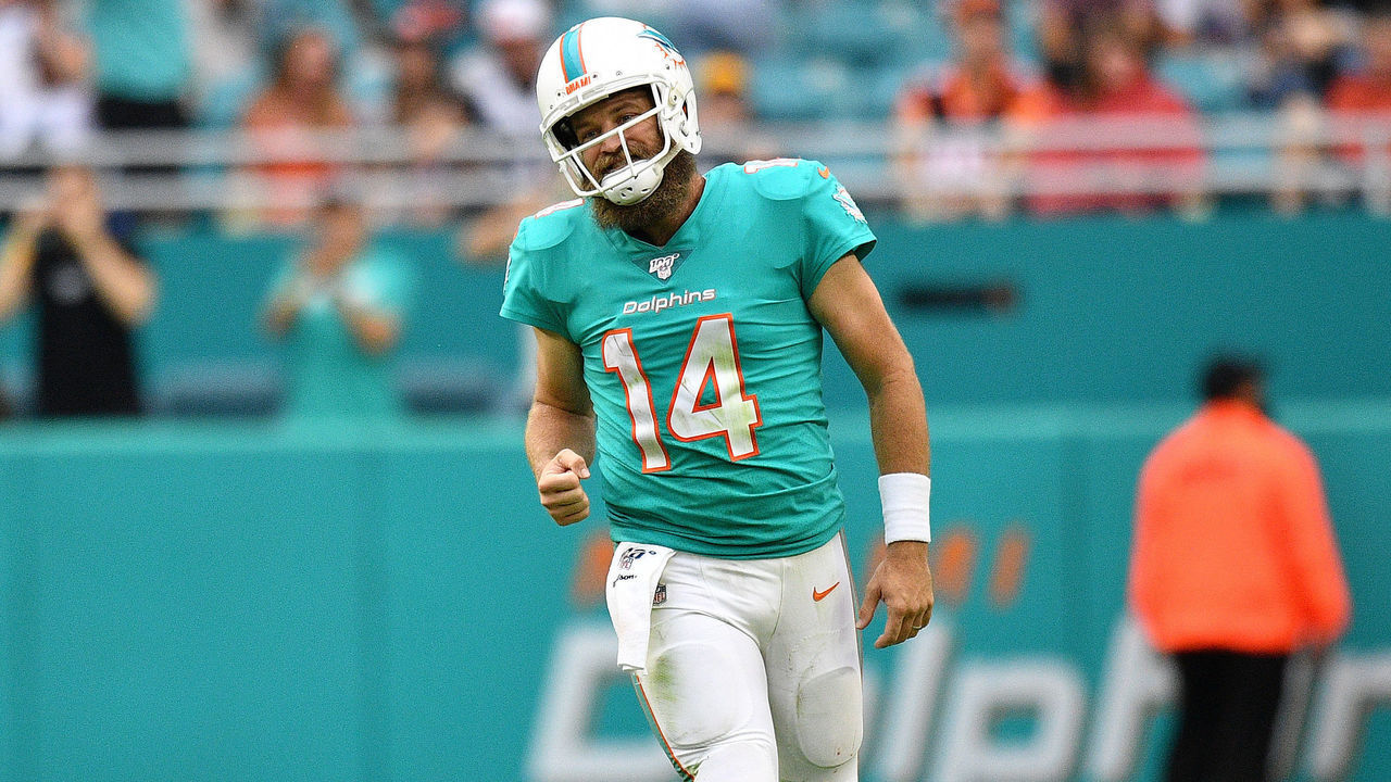 MIAMI, FLORIDA - DECEMBER 22: Ryan Fitzpatrick #14 of the Miami Dolphins react to throwing a touchdown pass against the Cincinnati Bengals in the second quarter at Hard Rock Stadium on December 22, 2019 in Miami, Florida.