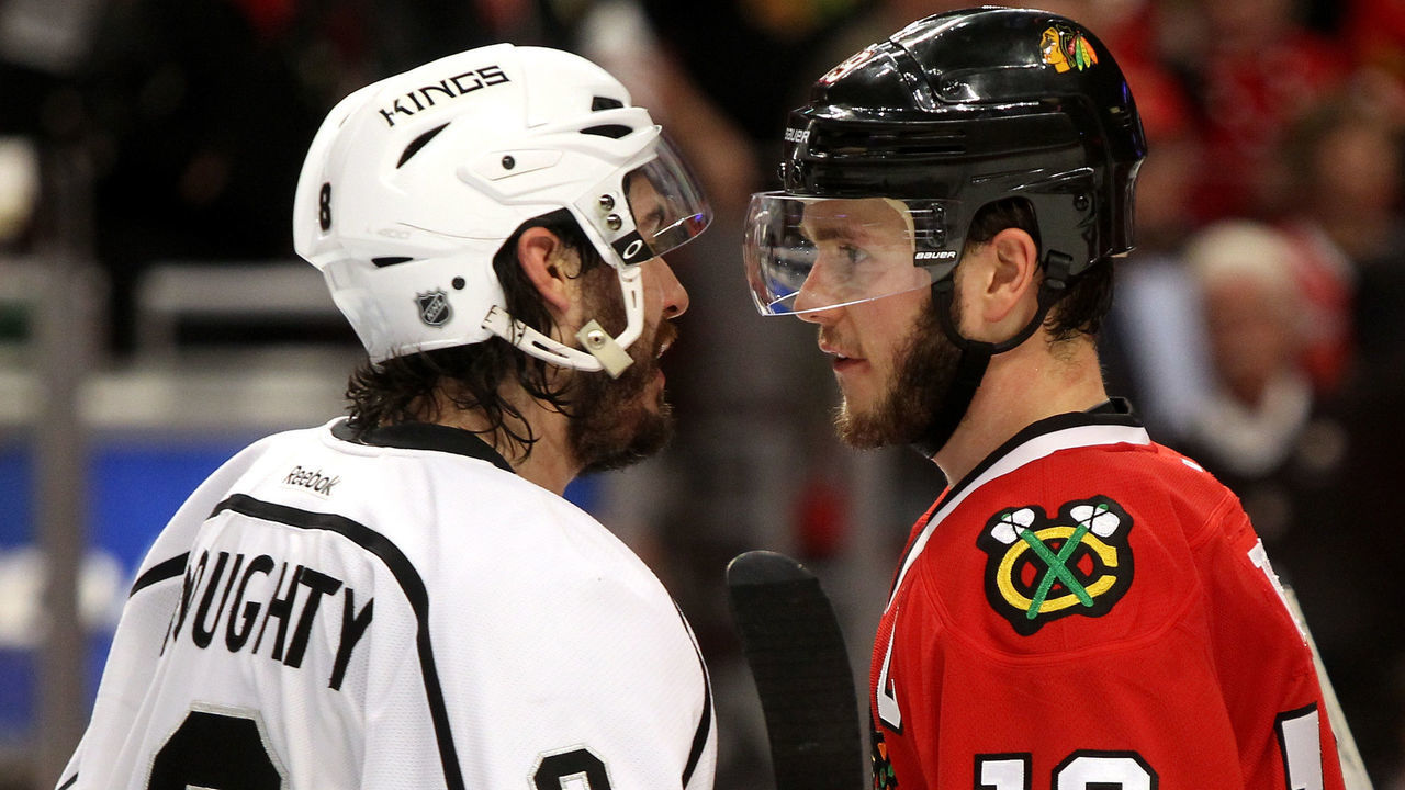 CHICAGO, IL - JUNE 01: Drew Doughty #8 of the Los Angeles Kings shakes hands with Jonathan Toews #19 of the Chicago Blackhawks after defeating the Blackhawks 5 to 4 in overtime of Game Seven to win the Western Conference Final in the 2014 Stanley Cup Playoffs at United Center on June 1, 2014 in Chicago, Illinois.