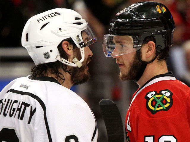 CHICAGO, IL - JUNE 01: Drew Doughty #8 of the Los Angeles Kings shakes hands with Jonathan Toews #19 of the Chicago Blackhawks after defeating the Blackhawks 5 to 4 in overtime of Game Seven to win the Western Conference Final in the 2014 Stanley Cup Playoffs at United Center on June 1, 2014 in Chicago, Illinois.