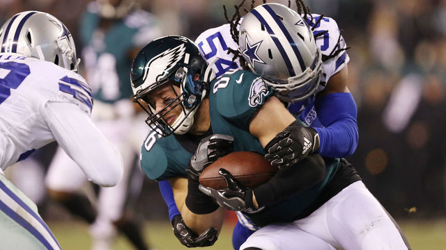 PHILADELPHIA, PENNSYLVANIA - DECEMBER 22: Jaylon Smith #54 of the Dallas Cowboys tackles Zach Ertz #86 of the Philadelphia Eagles during the second half in the game at Lincoln Financial Field on December 22, 2019 in Philadelphia, Pennsylvania.