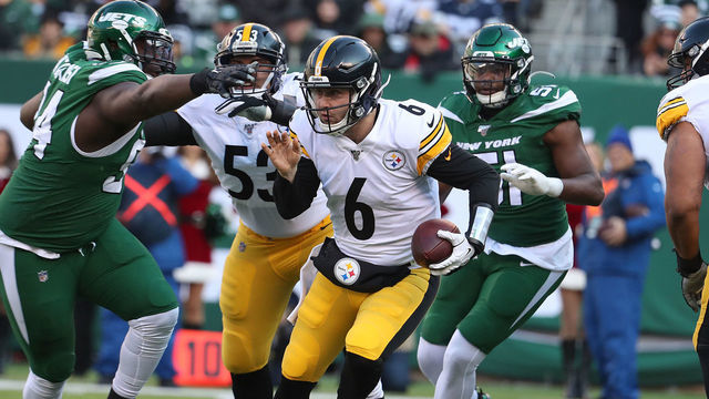 EAST RUTHERFORD, NEW JERSEY - DECEMBER 22: Foley Fatukasi #94 of the New York Jets sacks Devlin Hodges #6 of the Pittsburgh Steelers during their game at MetLife Stadium on December 22, 2019 in East Rutherford, New Jersey.