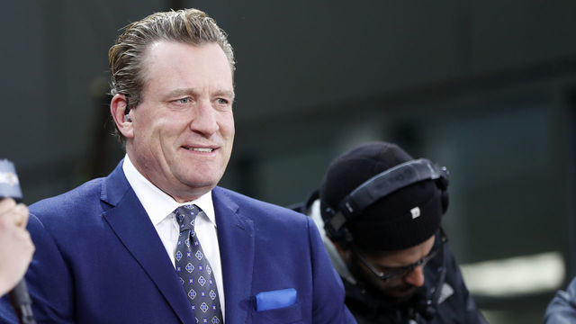 BOSTON, MA - MAY 29: NBCSN's Jeremy Roenick checks his phone before Game 2 of the 2019 Stanley Cup Finals between the Boston Bruins and the St. Louis Blues on May 29, 2019, at TD Garden in Boston, Massachusetts.