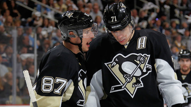 PITTSBURGH, PA - APRIL 26: Sidney Crosby #87 talks with Evgeni Malkin #71 of the Pittsburgh Penguins during the third period against the Columbus Blue Jackets in Game Five of the First Round of the 2014 Stanley Cup Playoffs at Consol Energy Center on April 26, 2014 in Pittsburgh, Pennsylvania.