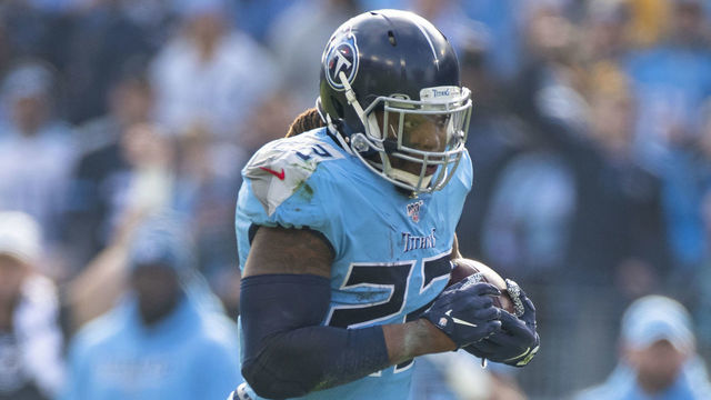NASHVILLE, TN - DECEMBER 15: Derrick Henry #22 of the Tennessee Titans carries the ball against the Houston Texans during the second quarter at Nissan Stadium on December 15, 2019 in Nashville, Tennessee. Houston defeats Tennessee 24-21.