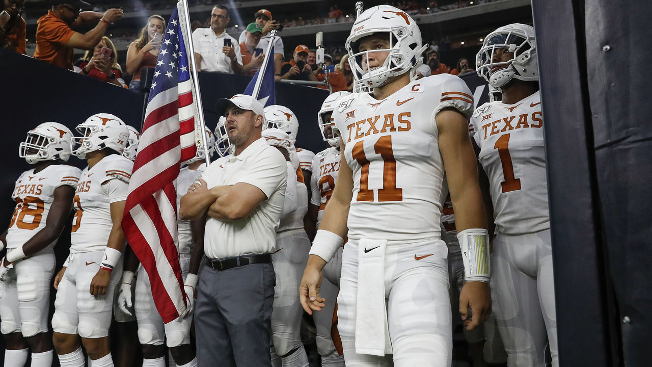 HOUSTON, TX - SEPTEMBER 14: Head coach Tom Herman of the Texas Longhorns prepares to lead the team onto the field before the game against the Rice Owls at NRG Stadium on September 14, 2019 in Houston, Texas.