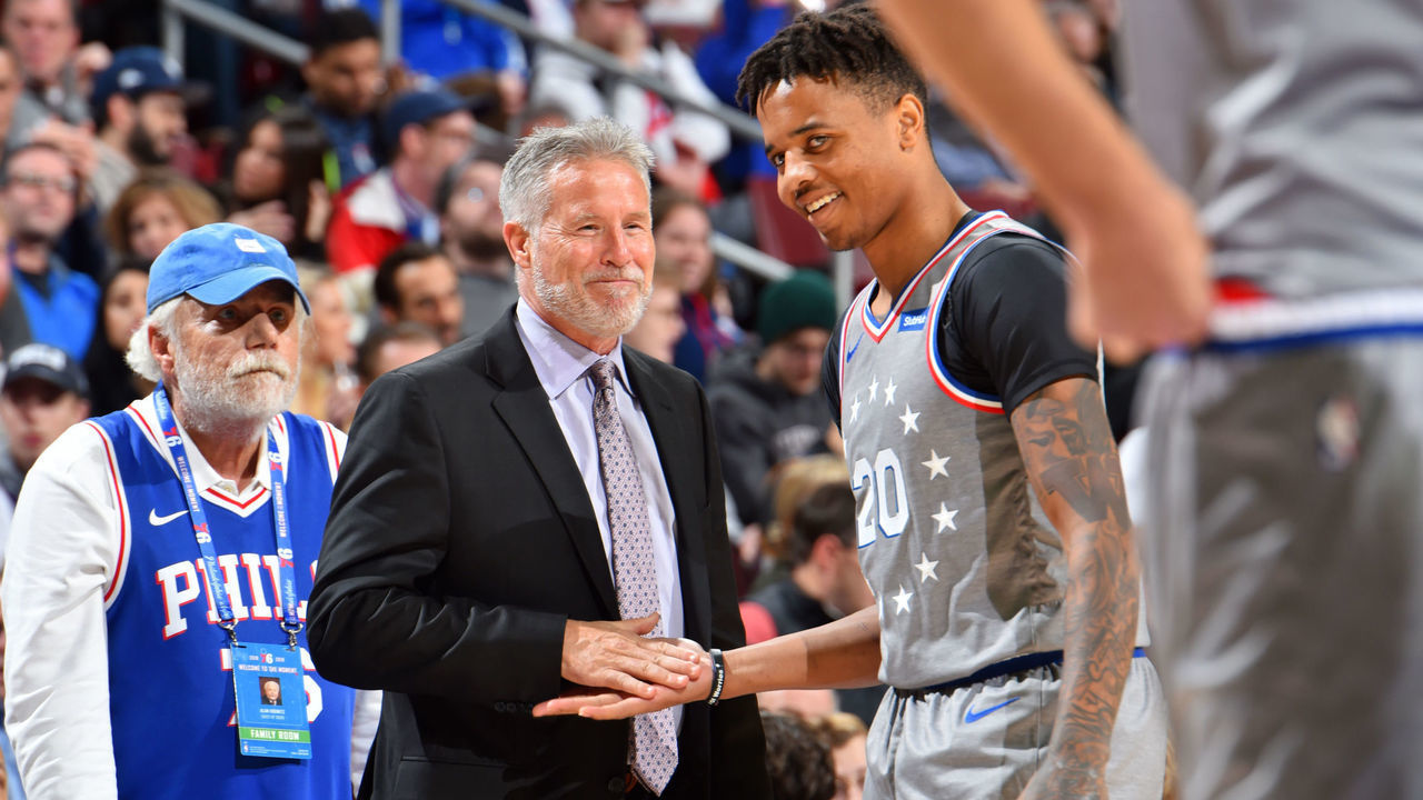PHILADELPHIA, PA - NOVEMBER 16: Head Coach Brett Brown and Markelle Fultz #20 of the Philadelphia 76ers high five during the game against the Utah Jazz on November 16, 2018 at Wells Fargo Center in Philadelphia, Pennsylvania. NOTE TO USER: User expressly acknowledges and agrees that, by downloading and/or using this photograph, user is consenting to the terms and conditions of the Getty Images License Agreement. Mandatory Copyright Notice: Copyright 2018 NBAE