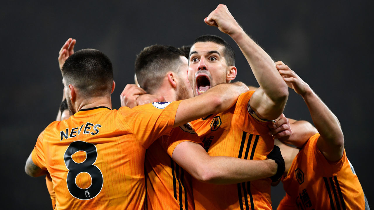 WOLVERHAMPTON, ENGLAND - DECEMBER 27: Conor Coady of Wolverhampton Wanderers celebrates his sides third goal with team mates, scored by Matt Doherty during the Premier League match between Wolverhampton Wanderers and Manchester City at Molineux on December 27, 2019 in Wolverhampton, United Kingdom.