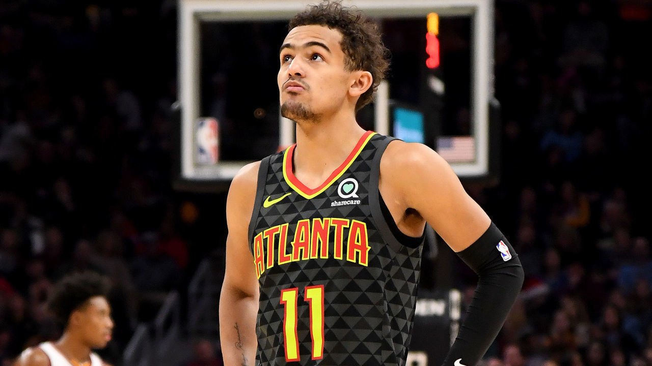 CLEVELAND, OHIO - DECEMBER 23: Trae Young #11 of the Atlanta Hawks waits during a free-throw in the second half against the Cleveland Cavaliers at Rocket Mortgage Fieldhouse on December 23, 2019 in Cleveland, Ohio. The Cavaliers defeated the Hawks 121-118. NOTE TO USER: User expressly acknowledges and agrees that, by downloading and/or using this photograph, user is consenting to the terms and conditions of the Getty Images License Agreement.