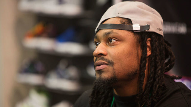 BELLEVUE, WA - NOVEMBER 13: Seattle Seahawks Running Back Marshawn Lynch attends in store appearance for the launch of BEASTMODE x PSD at Champs at Bellevue Square on November 13, 2015 in Bellevue, Washington.
