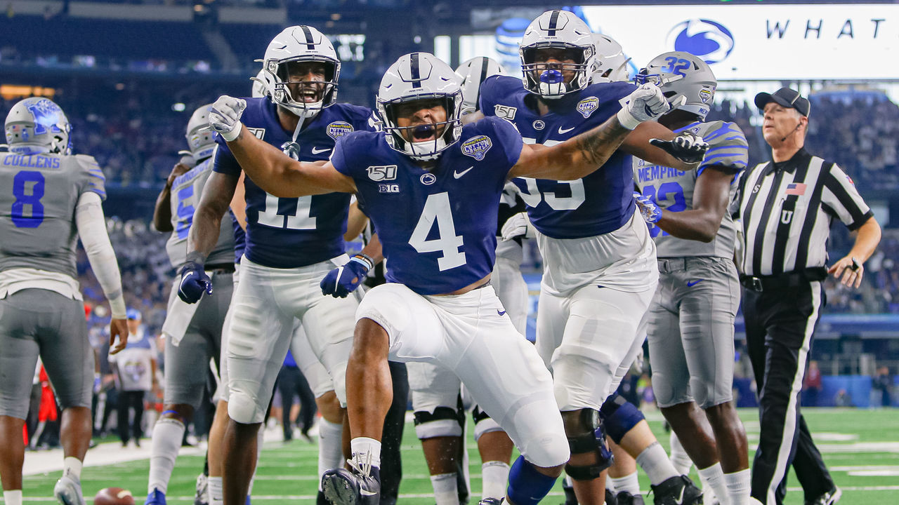 ARLINGTON, TX - DECEMBER 28: Penn State Nittany Lions running back Journey Brown (4) celebrates his 32 yard touchdown rush during the Cotton Bowl Classic between the Memphis Tigers and Penn State Nittany Lions on December 28, 2019 at AT&T Stadium in Arlington, TX.