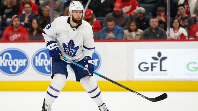 DETROIT, MI - NOVEMBER 27: Toronto Maple Leafs defenseman Jake Muzzin (8) skates during a regular season NHL hockey game between the Toronto Maple Leafs and the Detroit Red Wings on November 27, 2019, at Little Caesars Arena in Detroit, Michigan.