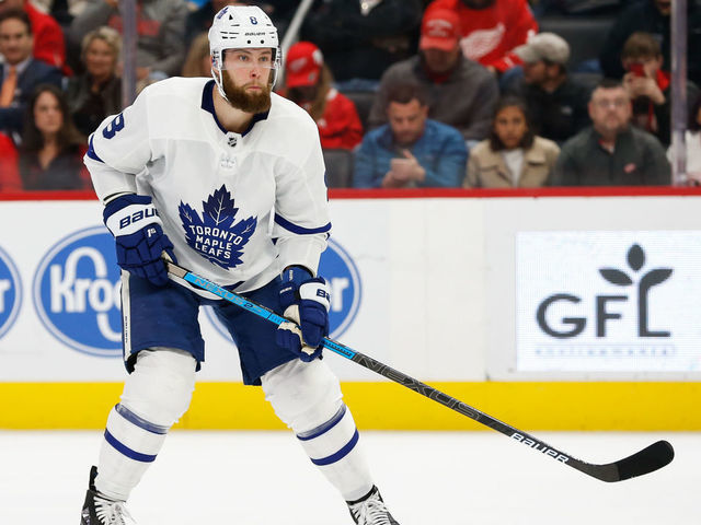 DETROIT, MI - NOVEMBER 27: Toronto Maple Leafs defenseman Jake Muzzin (8) skates during a regular season NHL hockey game between the Toronto Maple Leafs and the Detroit Red Wings on November 27, 2019, at Little Caesars Arena in Detroit, Michigan.