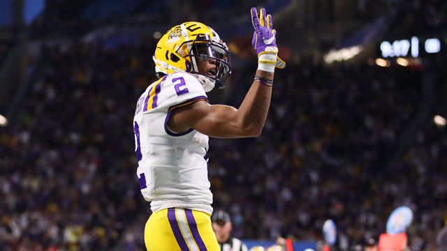 ATLANTA, GEORGIA - DECEMBER 28: Wide receiver Justin Jefferson #2 of the LSU Tigers celebrates his forth touchdown in the second quarter against the Oklahoma Sooners during the Chick-fil-A Peach Bowl at Mercedes-Benz Stadium on December 28, 2019 in Atlanta, Georgia.