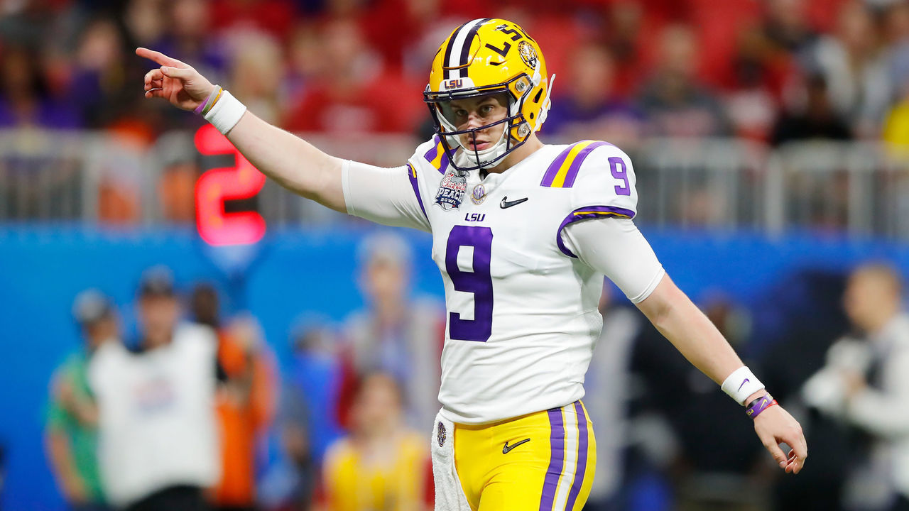 ATLANTA, GEORGIA - DECEMBER 28: Quarterback Joe Burrow #9 of the LSU Tigers reacts after a touchdown in the third quarter over the Oklahoma Sooners during the Chick-fil-A Peach Bowl at Mercedes-Benz Stadium on December 28, 2019 in Atlanta, Georgia.