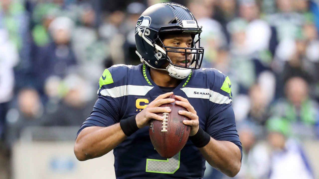 SEATTLE, WASHINGTON - DECEMBER 22: Russell Wilson #3 of the Seattle Seahawks looks to throw the ball against the Arizona Cardinals in the first quarter during their game at CenturyLink Field on December 22, 2019 in Seattle, Washington.