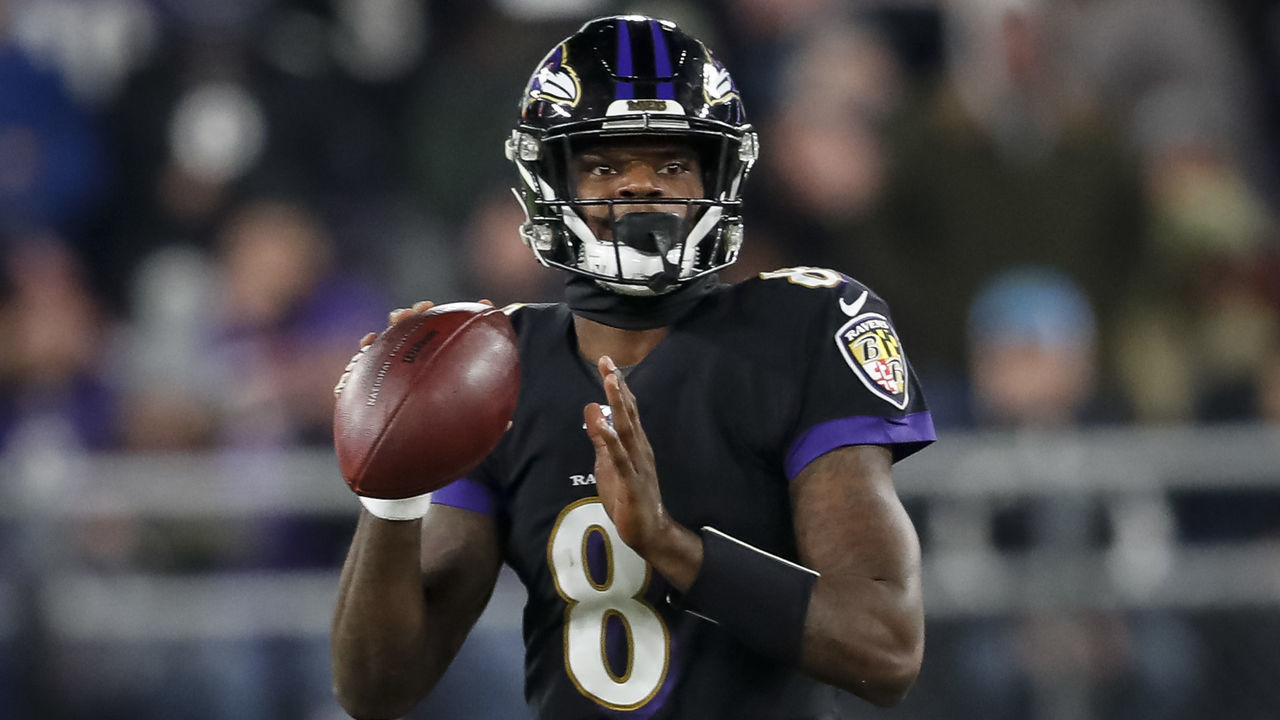 BALTIMORE, MD - DECEMBER 12: Lamar Jackson #8 of the Baltimore Ravens looks to pass against the New York Jets during the first half at M&T Bank Stadium on December 12, 2019 in Baltimore, Maryland.