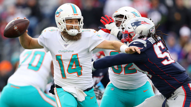 FOXBOROUGH, MASSACHUSETTS - DECEMBER 29: Ryan Fitzpatrick #14 of the Miami Dolphins looks to pass against the New England Patriots at Gillette Stadium on December 29, 2019 in Foxborough, Massachusetts.