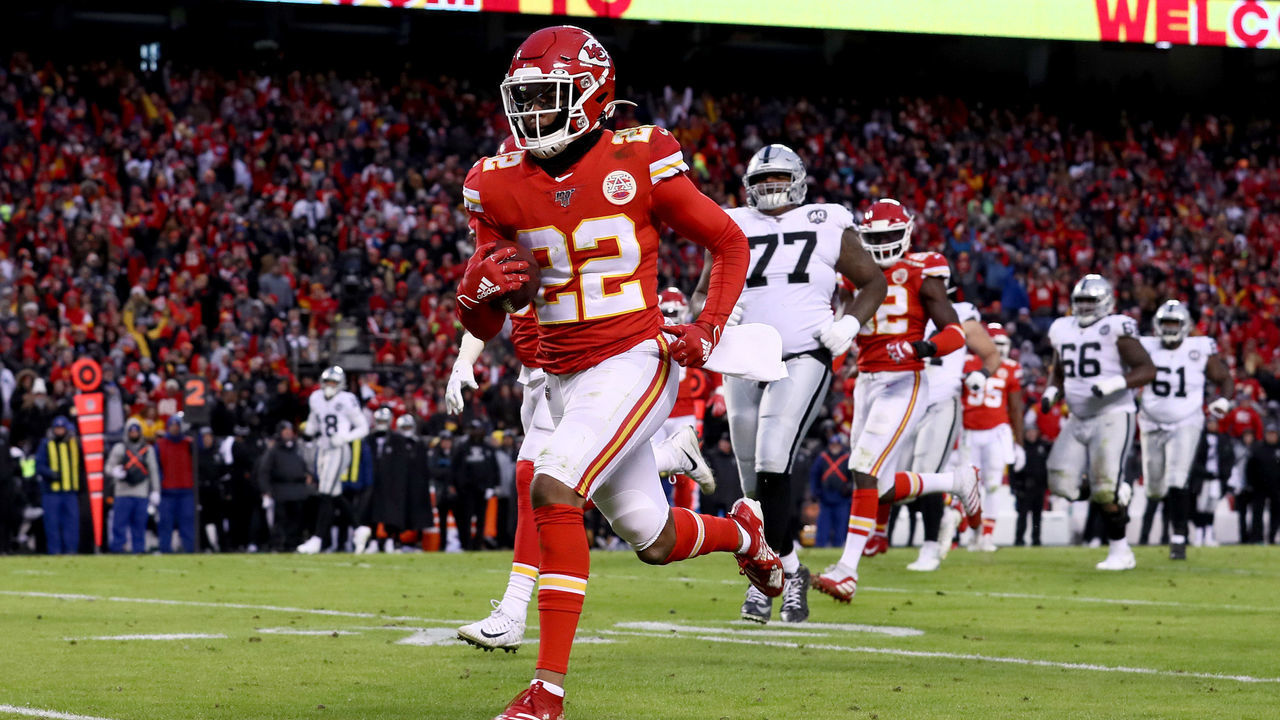 KANSAS CITY, MISSOURI - DECEMBER 01: Juan Thornhill #22 of the Kansas City Chiefs scores a touchdown after intercepting a ball intended for Tyrell Williams #16 of the Oakland Raiders during the second quarter in the game at Arrowhead Stadium on December 01, 2019 in Kansas City, Missouri.