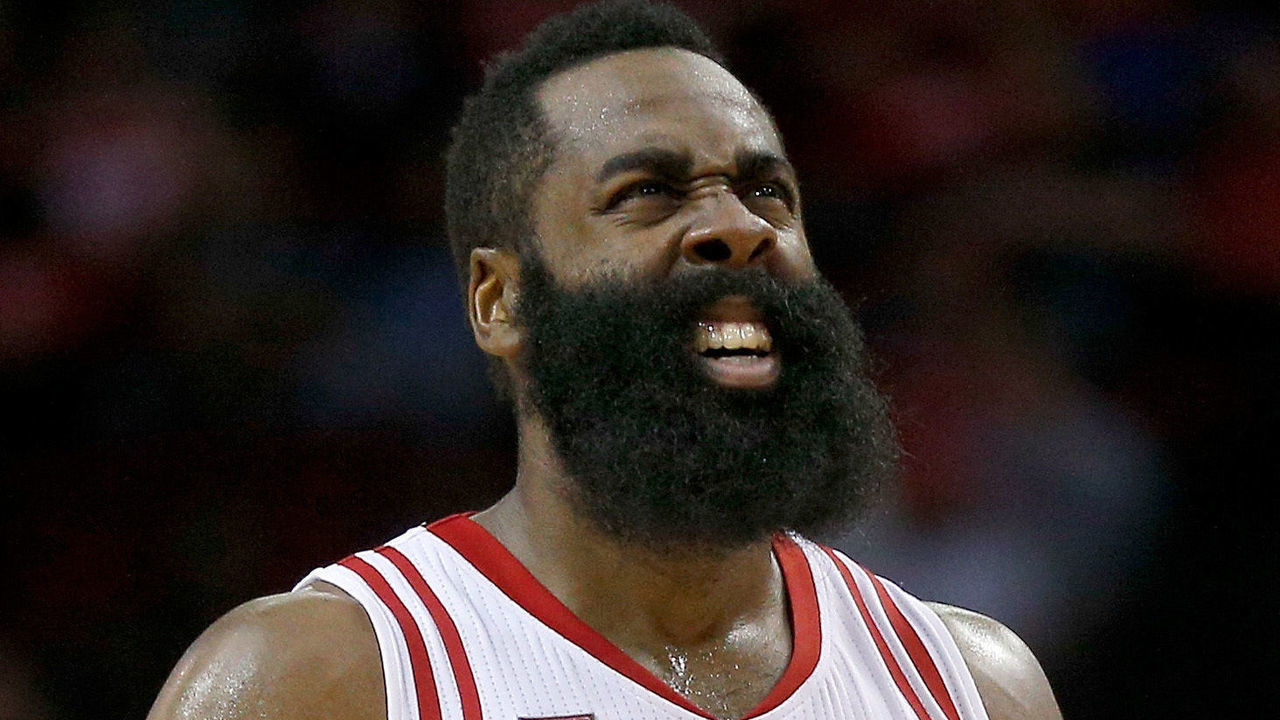 HOUSTON, TX - JANUARY 10: James Harden #13 of the Houston Rockets winces after being in the eye in the fourth quarter against the Charlotte Hornets at Toyota Center on January 10, 2017 in Houston, Texas. NOTE TO USER: User expressly acknowledges and agrees that, by downloading and/or using this photograph, user is consenting to the terms and conditions of the Getty Images License Agreement.