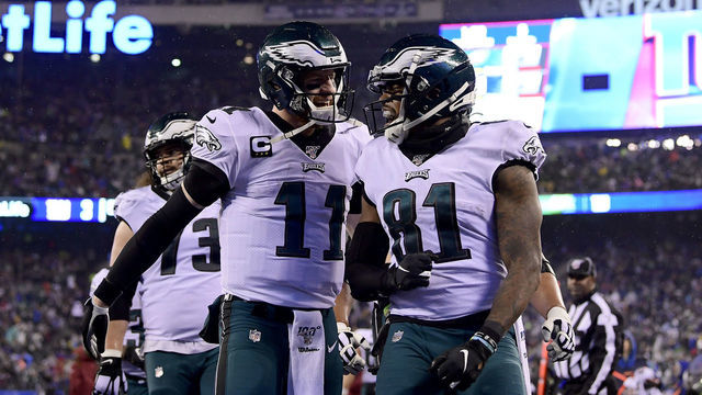 EAST RUTHERFORD, NEW JERSEY - DECEMBER 29: Josh Perkins #81 of the Philadelphia Eagles celebrates with Carson Wentz #11 after scoring a touchdown against the New York Giants during the second quarter in the game at MetLife Stadium on December 29, 2019 in East Rutherford, New Jersey.