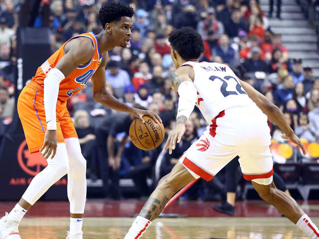 TORONTO, ON - DECEMBER 29: Shai Gilgeous-Alexander #2 of the Oklahoma City Thunder dribbles the ball as Patrick McCaw #22 of the Toronto Raptors defends during the first half of an NBA game at Scotiabank Arena on December 29, 2019 in Toronto, Canada.