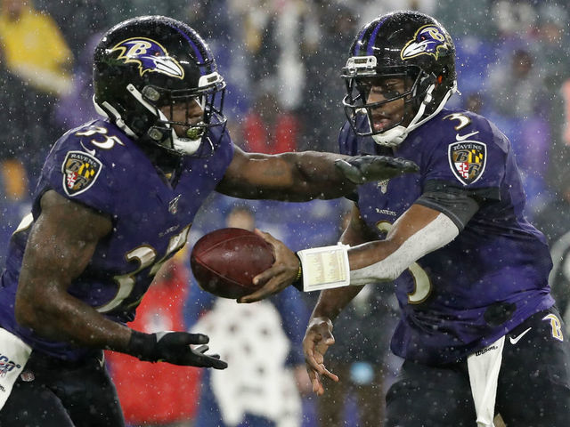 BALTIMORE, MARYLAND - DECEMBER 29: Quarterback Robert Griffin III #3 of the Baltimore Ravens hands off to running back Gus Edwards #35 of the Baltimore Ravens against the Pittsburgh Steelers during the third quarter at M&T Bank Stadium on December 29, 2019 in Baltimore, Maryland.