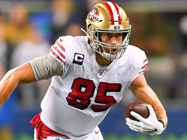SEATTLE, WASHINGTON - DECEMBER 29: George Kittle #85 of the San Francisco 49ers runs for more yards after a catch from Jimmy Garoppolo during the first quarter of the game against the Seattle Seahawks at CenturyLink Field on December 29, 2019 in Seattle, Washington.