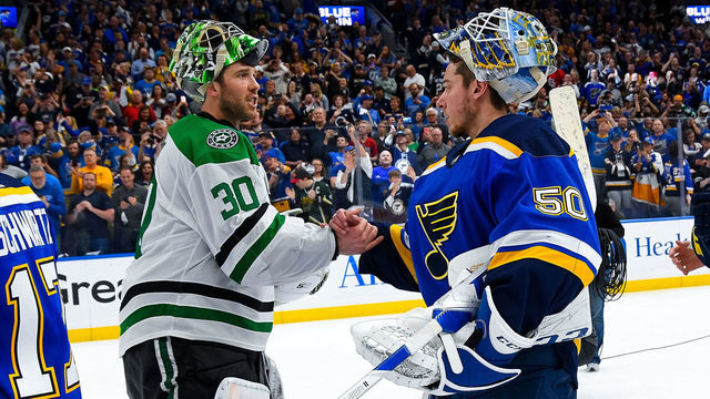 ST. LOUIS, MO - MAY 7: Ben Bishop #30 of the Dallas Stars and Jordan Binnington #50 of the St. Louis Blues shake hands after Game Seven of the Western Conference Second Round during the 2019 NHL Stanley Cup Playoffs at Enterprise Center on May 7, 2019 in St. Louis, Missouri.
