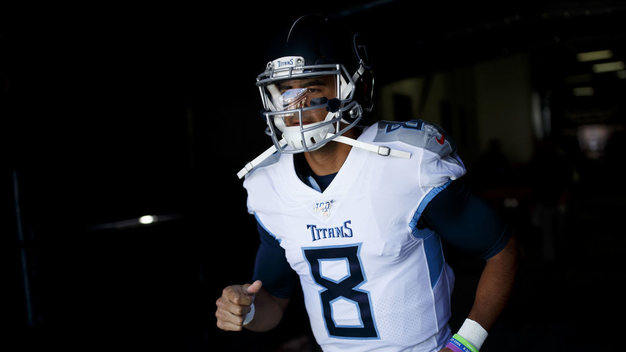 DENVER, CO - OCTOBER 13: Quarterback Marcus Mariota #8 of the Tennessee Titans runs through the tunnel before a game against the Denver Broncos at Empower Field at Mile High on October 13, 2019 in Denver, Colorado.