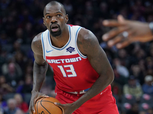 SACRAMENTO, CALIFORNIA - DECEMBER 02: Dewayne Dedmon #13 of the Sacramento Kings looks to pass the ball against the Chicago Bulls during the first half of an NBA basketball game at Golden 1 Center on December 02, 2019 in Sacramento, California.