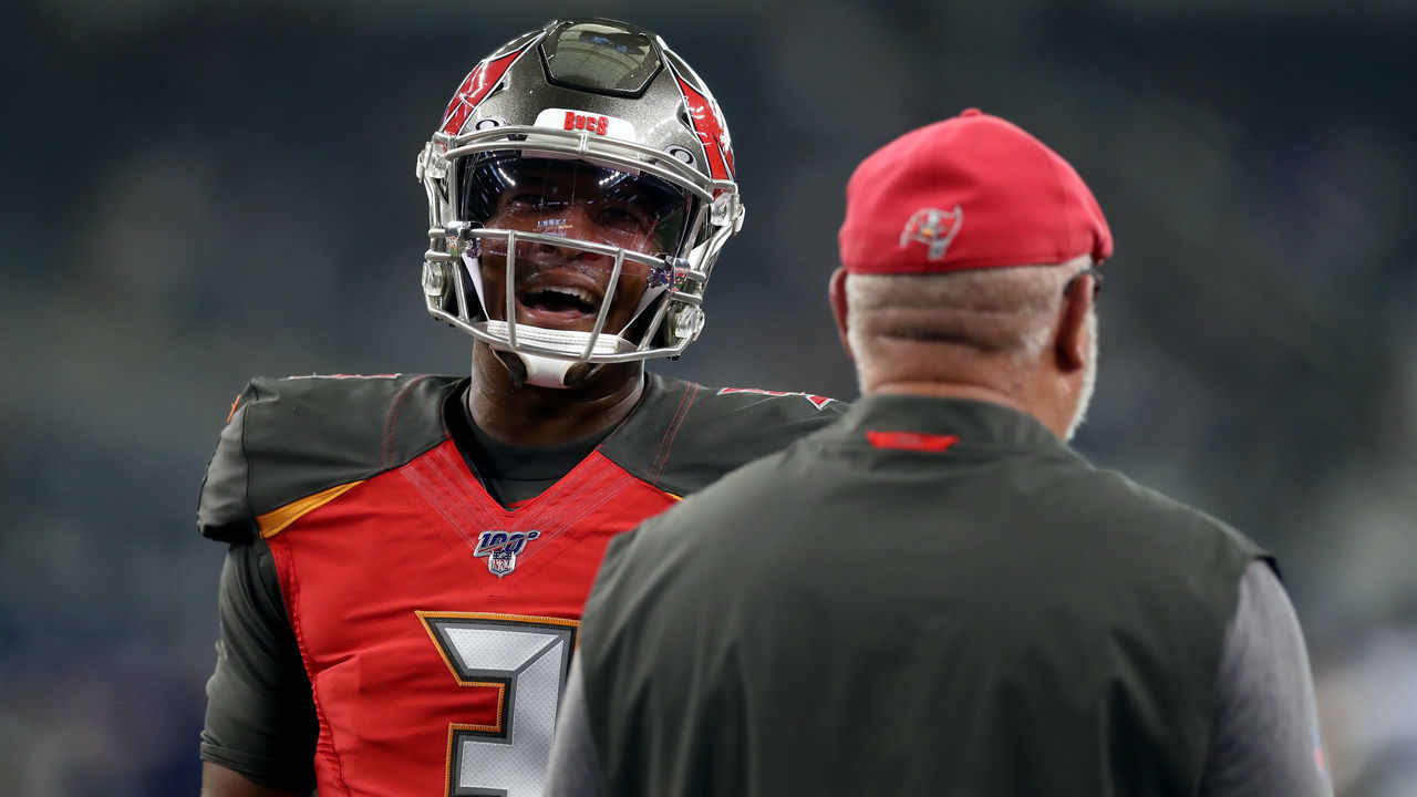 ARLINGTON, TEXAS - AUGUST 29: Jameis Winston #3 of the Tampa Bay Buccaneers talks with head coach Bruce Arians of the Tampa Bay Buccaneers before a NFL preseason game at AT&T Stadium on August 29, 2019 in Arlington, Texas.