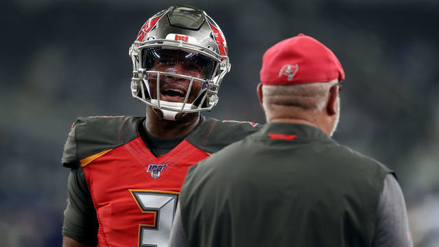 ARLINGTON, TEXAS - AUGUST 29: Jameis Winston #3 of the Tampa Bay Buccaneers talks with head coach Bruce Arians of the Tampa Bay Buccaneers before a NFL preseason game at AT&T Stadium on August 29, 2019 in Arlington, Texas.