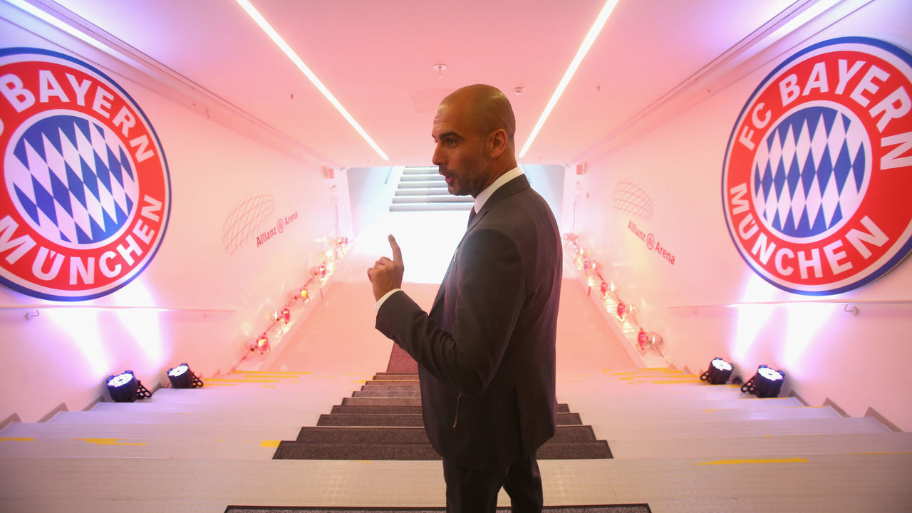 MUNICH, GERMANY - JUNE 24: FC Bayern Muenchen new Head Coach Josep Guardiola walks at the players tunnel to the pitch inside the Allianz Arena on the day he is unveiled as Bayern's new coach on June 24, 2013 in Munich, Germany.