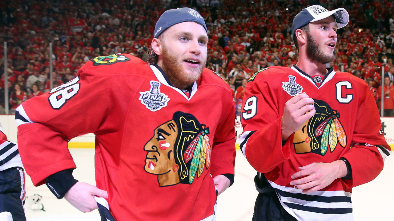 CHICAGO, IL - JUNE 15: Patrick Kane #88 and Jonathan Toews #19 of the Chicago Blackhawks celebrate after defeating the Tampa Bay Lightning by a score of 2-0 in Game Six to win the 2015 NHL Stanley Cup Final at the United Center on June 15, 2015 in Chicago, Illinois.