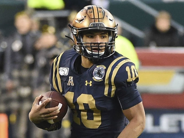 PHILADELPHIA, PA - DECEMBER 14: Navy Midshipmen quarterback Malcolm Perry (10) runs for a first down during the Army-Navy game on December 14, 2019 at Lincoln Financial Field in Philadelphia PA.