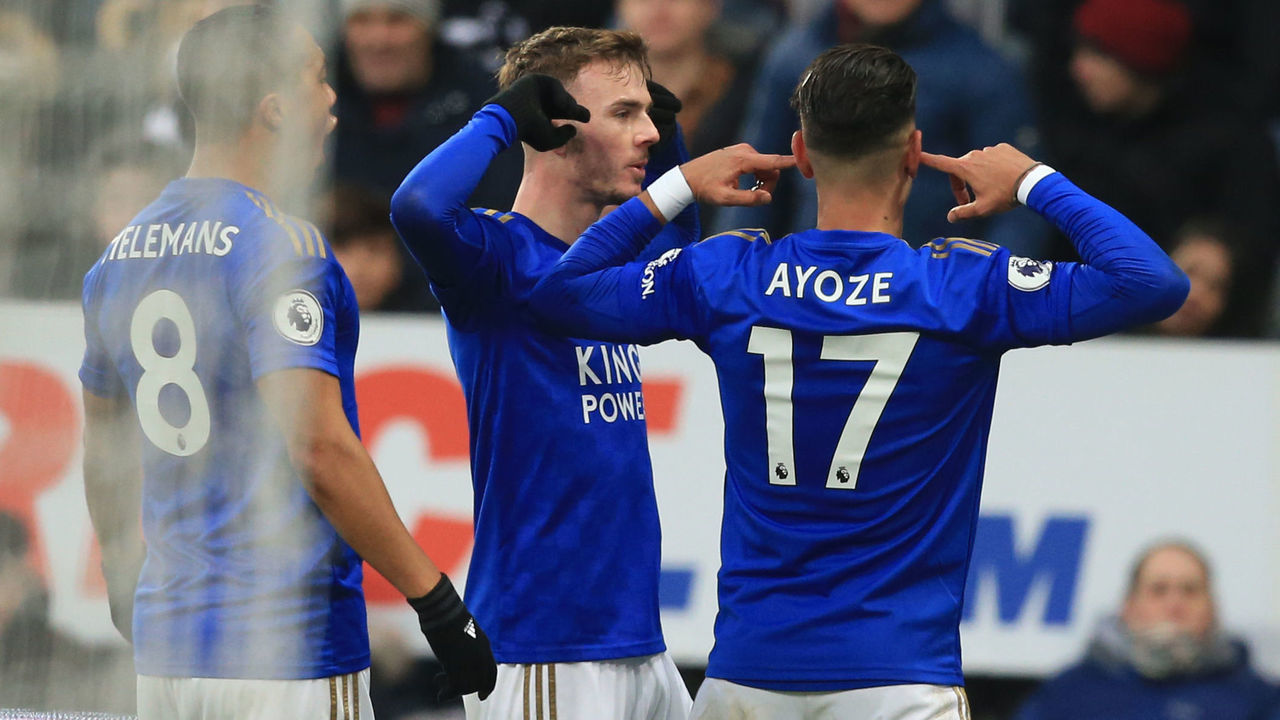 Leicester City's Spanish striker Ayoze Perez (R) celebrates with teammates after scoring during the English Premier League football match between Newcastle United and Leicester City at St James' Park in Newcastle-upon-Tyne, north east England on January 1, 2020.