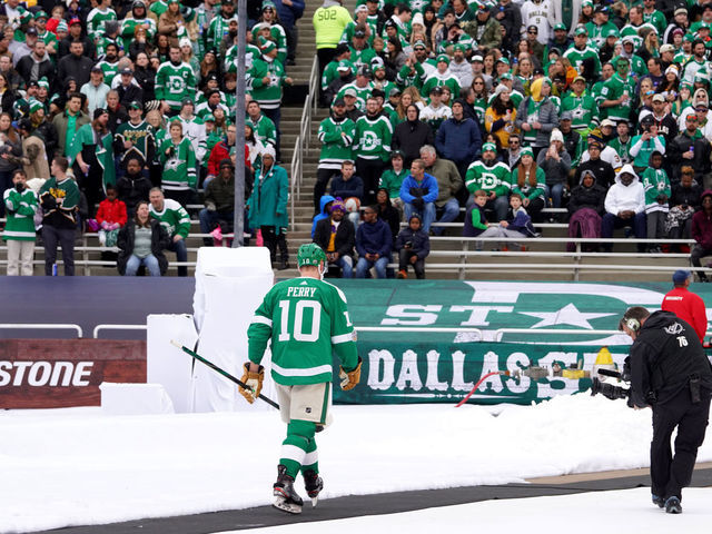 DALLAS, TEXAS - JANUARY 01: Corey Perry #10 of the Dallas Stars walks to the locker room after receiving a major penalty for elbowing and a game misconduct during the first period of the 2020 NHL Winter Classic between the Nashville Predators and the Dallas Stars at Cotton Bowl on January 01, 2020 in Dallas, Texas.