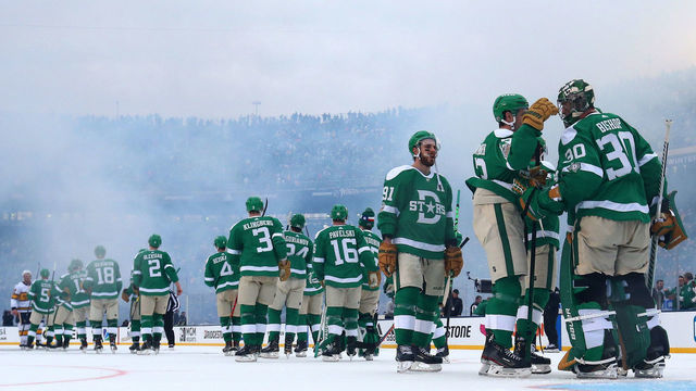 DALLAS, TEXAS - JANUARY 01: Ben Bishop #30 of the Dallas Stars and Mattias Janmark #13 celebrate a 4-2 win against the Nashville Predators during the 2020 Bridgestone NHL Winter Classic at Cotton Bowl on January 01, 2020 in Dallas, Texas.