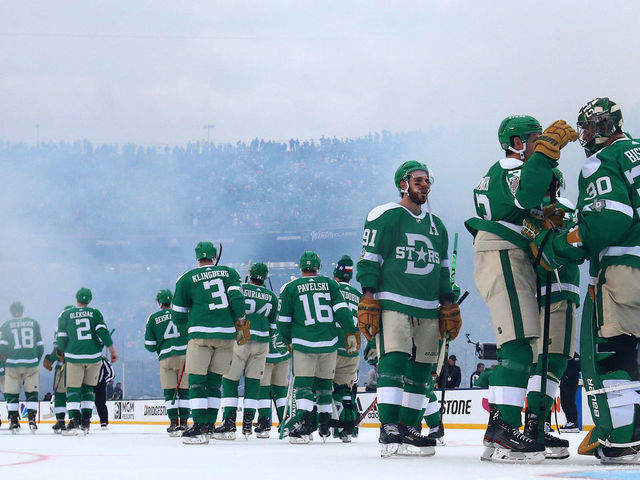 DALLAS, TEXAS - JANUARY 01: Ben Bishop #30 of the Dallas Stars and Mattias Janmark #13 celebrate a 4-2 win against the Nashville Predators during the 2020 Bridgestone NHL Winter Classic at Cotton Bowl on January 01, 2020 in Dallas, Texas.