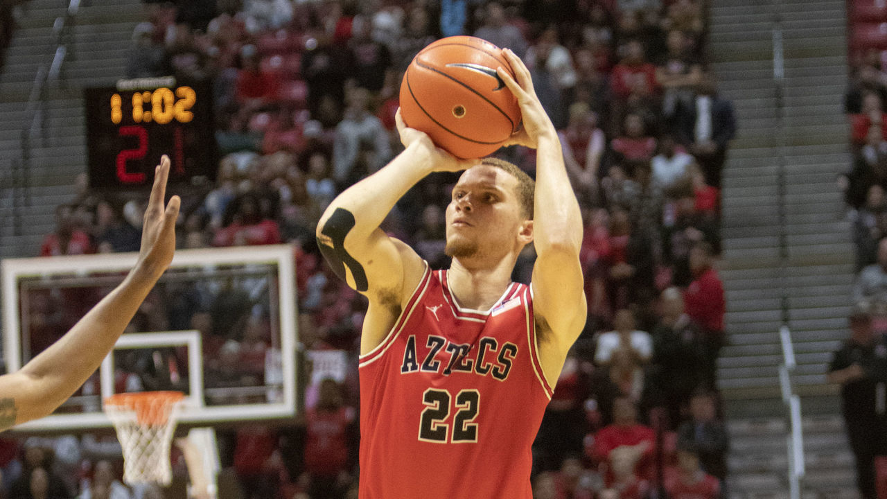 SAN DIEGO, CA - DECEMBER 08: San Diego State University Aztecs guard Malachi Flynn (22) shoots during the game between the San José Spartans and the San Diego State University Aztecs on December 08, 2019 at the Steve Fisher Court at Viejas Arena in San Diego, California.