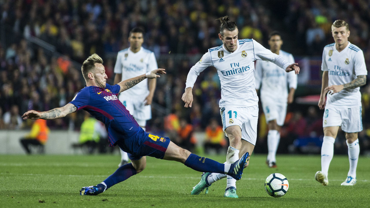 04 Ivan Rakitic from Croatia of FC Barcelona defeding 11 Gareth Bale from Gales of Real Madrid during the La Liga derby football match between FC Barcelona v Real Madrid at Camp Nou Stadium in Spain on May 6 of 2018.