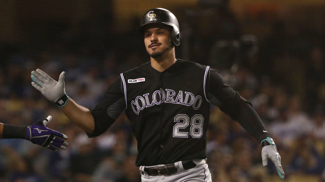 LOS ANGELES, CALIFORNIA - SEPTEMBER 03: Nolan Arenado #28 of the Colorado Rockies celebrates after hitting a solo home run in the fourth inning of the MLB game against the Los Angeles Dodgers at Dodger Stadium on September 03, 2019 in Los Angeles, California.