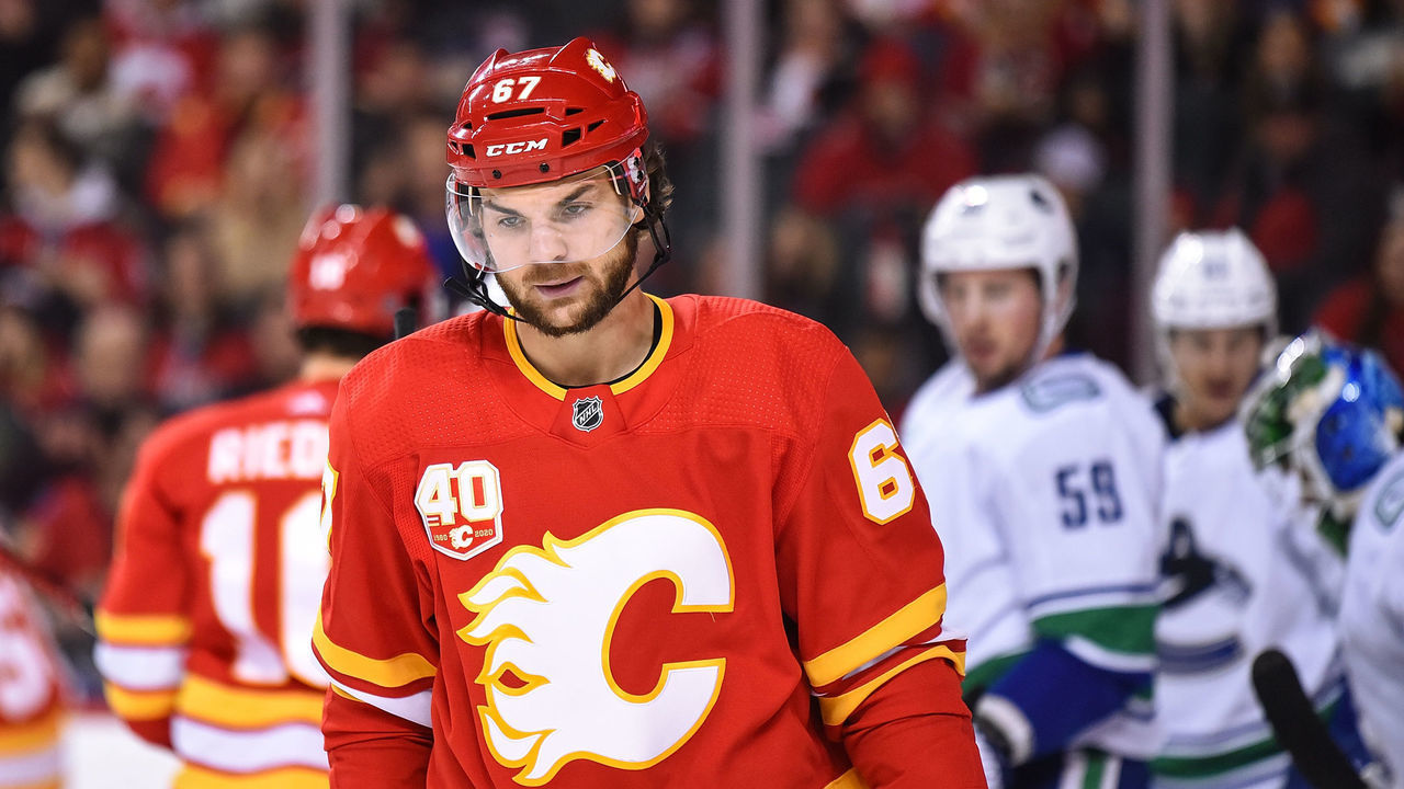 CALGARY, AB - DECEMBER 29: Calgary Flames Right Wing Michael Frolik (67) looks on after a whistle during the first period of an NHL game where the Calgary Flames hosted the Vancouver Canucks on December 29, 2019, at the Scotiabank Saddledome in Calgary, AB.