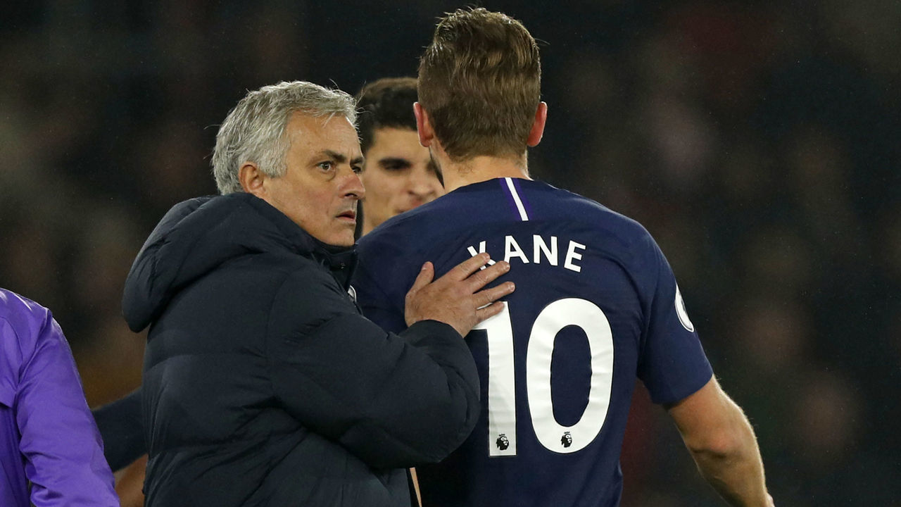 Tottenham Hotspur's Portuguese head coach Jose Mourinho (L) consoles Tottenham Hotspur's English striker Harry Kane (R) as he leaves the pitch having picked up an injury during the English Premier League football match between Southampton and Tottenham at St Mary's Stadium in Southampton, southern England on January 1, 2020.