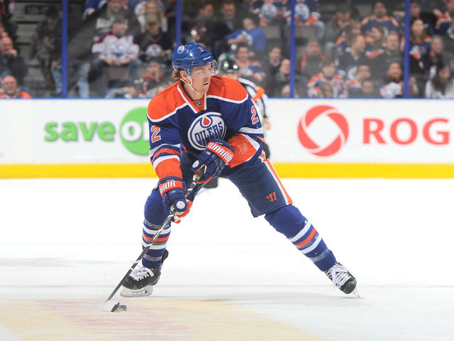 GIF: Oilers' Petry breaks the glass with a slap shot from center ice