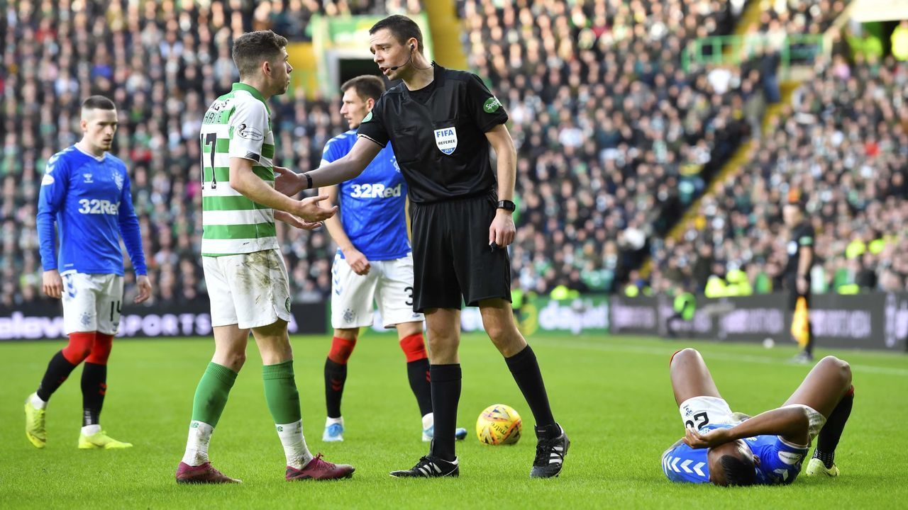 GLASGOW, SCOTLAND - DECEMBER 29: Alfredo Morelos is fouled by Ryan Christie during the Ladbrokes Premiership match between Celtic and Rangers at Celtic Park on December 29, 2019 in Glasgow, Scotland.