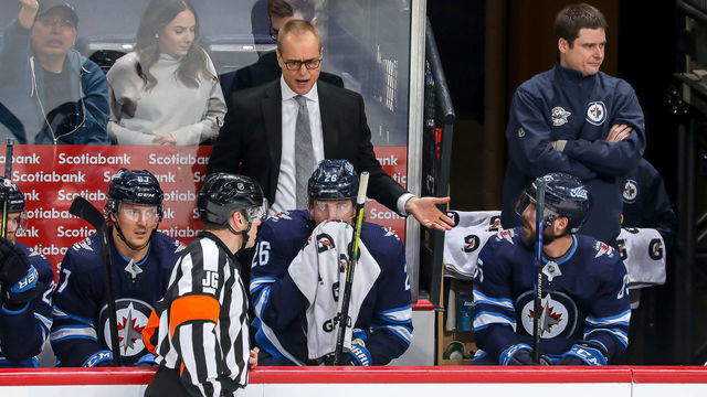 WINNIPEG, MB - JANUARY 2: Head Coach Paul Maurice of the Winnipeg Jets has words with referee Ian Walsh #29 during a first period stoppage in play against the Toronto Maple Leafs at the Bell MTS Place on January 2, 2020 in Winnipeg, Manitoba, Canada.