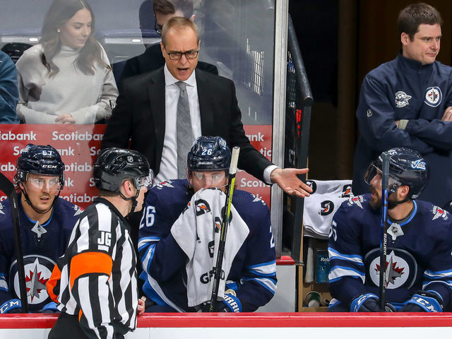 WINNIPEG, MB - JANUARY 2: Head Coach Paul Maurice of the Winnipeg Jets has words with referee Ian Walsh #29 during a first period stoppage in play against the Toronto Maple Leafs at the Bell MTS Place on January 2, 2020 in Winnipeg, Manitoba, Canada.