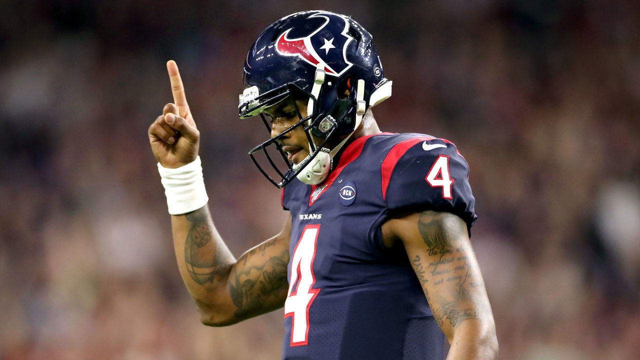 HOUSTON, TEXAS - JANUARY 04: Deshaun Watson #4 of the Houston Texans celebrates a touchdown pass against the Buffalo Bills during the fourth quarter of the AFC Wild Card Playoff game at NRG Stadium on January 04, 2020 in Houston, Texas.